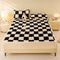 Surmatelas et taie d'oreiller en peluche à damier chaud