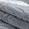 Housse de canapé antidérapante en peluche douce à motif ondulé